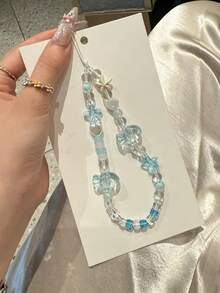 1 pezzo Cordino per telefono con perline a forma di stella marina e pesce, colore blu sale marino, accessorio estivo fresco per cinturino macchina fotografica CCD - celeste - Visualizzare 4