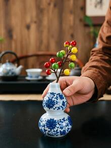 1 chiếc bình sứ xanh trắng, nhiều kiểu dáng, thích hợp trang trí phòng ngủ, sân vườn, văn phòng, nhà cửa. - A - Xem 6