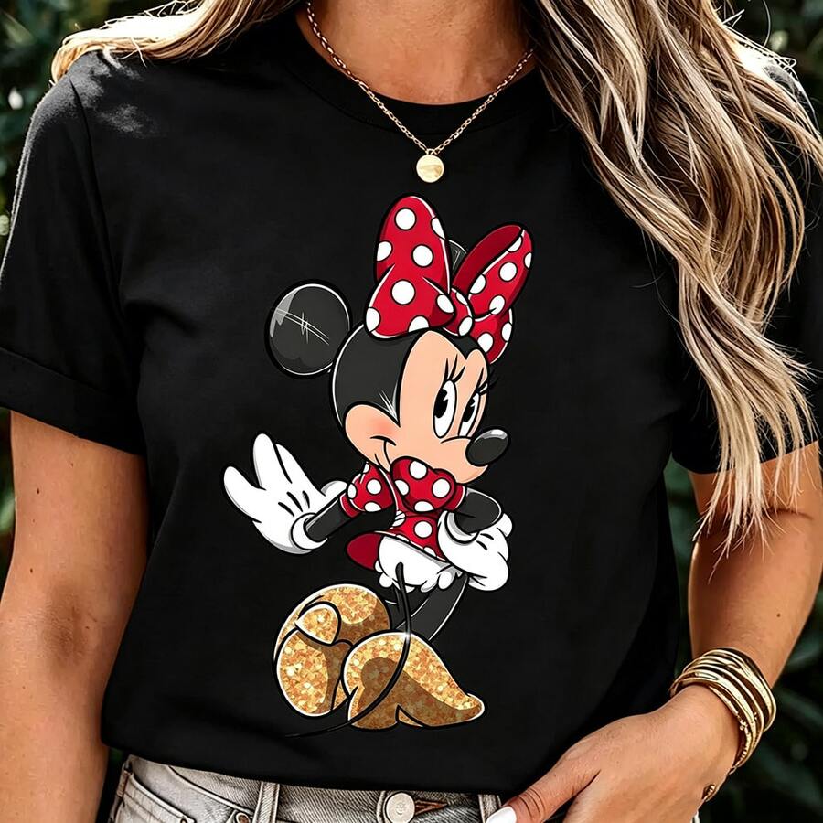 (Authorized By Disney. Mickey Mouse) Classic Minnie Image, Iconic Bow And Coat With Red Background And White Spots, Shoes With Golden Sequins, A Group Of Elegant Ladies And Ladies' Cotton T-Shirts. The Fabric Is Soft, Comfortable And Breathable, Suitable For Daily Wear, Shopping, Travel, Parties And Home Use. Men's And Women's Clothes, As Well As Lovers' Clothes, Are Also Suitable As Exquisite Gifts. Every Woman Should Have One. - màu đen - Xem 1