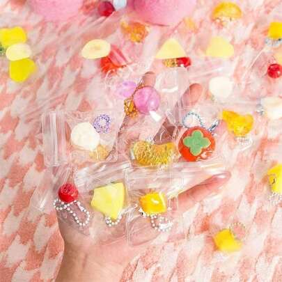 Bộ 5 móc khóa đồ chơi bóp mềm mini dễ thương đang thịnh hành, hình trái cây/thức ăn ngẫu nhiên, đồ chơi bóp mềm đàn hồi chậm, đồ chơi giảm căng thẳng dính, lý tưởng cho thanh thiếu niên, người lớn, dịp tựu trường, Giáng sinh, quà tặng tiệc tùng, quà tặng bất ngờ tự làm.