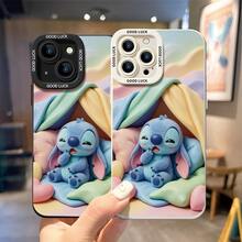 Officially Licensed Disney Lilo & Stitch Phone Case, This Protective Phone Case Features A Sleepy Print Of Yawning Stitch Curled Up In A Pastel-Colored Tent With Pillows, Made With Flexible, Durable TPU Material To Protect Against Everyday Scratches, Bumps, And Minor Impacts, With A Raised Camera Frame Printed With "GOOD LUCK" Text For Extra Lens Protection, Slim And Lightweight Construction That Adds Minimal Bulk And Fits Easily In Pockets And Bags, Compatible With IPhone 17, 16, 15, 14, 13, 12, 11 Pro Series And Galaxy S22, S23, S24, S25 Models, Making It A Charming Choice For Stitch Fans And Disney Lovers, Ideal For Birthdays, Holidays, Or Any Special Occasion To Surprise Family And Friends. - trắng - Xem 4