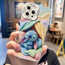 Officially Licensed Disney Lilo & Stitch Phone Case, This Protective Phone Case Features A Sleepy Print Of Yawning Stitch Curled Up In A Pastel-Colored Tent With Pillows, Made With Flexible, Durable TPU Material To Protect Against Everyday Scratches, Bumps, And Minor Impacts, With A Raised Camera Frame Printed With "GOOD LUCK" Text For Extra Lens Protection, Slim And Lightweight Construction That Adds Minimal Bulk And Fits Easily In Pockets And Bags, Compatible With IPhone 17, 16, 15, 14, 13, 12, 11 Pro Series And Galaxy S22, S23, S24, S25 Models, Making It A Charming Choice For Stitch Fans And Disney Lovers, Ideal For Birthdays, Holidays, Or Any Special Occasion To Surprise Family And Friends. - trắng - Xem 2