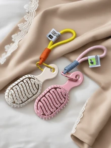 Bàn chải tóc mini hình bầu dục, nhỏ gọn, phù hợp cho nữ, thích hợp mang theo khi đi du lịch, hoạt động ngoài trời, đi làm, đi học. Bàn chải massage nhẹ có dây treo, thích hợp cho tóc khô và ướt, sử dụng hàng ngày và khi đi du lịch, nhiều màu sắc để lựa chọn. - A - Xem 5