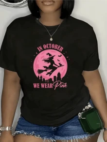 Witch Flying On A Broomstick In Front Of A Large Pink Moon Symbolizing Feminine Strength And Unity In October With A Small Cat Accompanying Her Over A City Alluding To The Magical Night. Modern Casual Women's T-Shirt - 黑色 - 查看 8