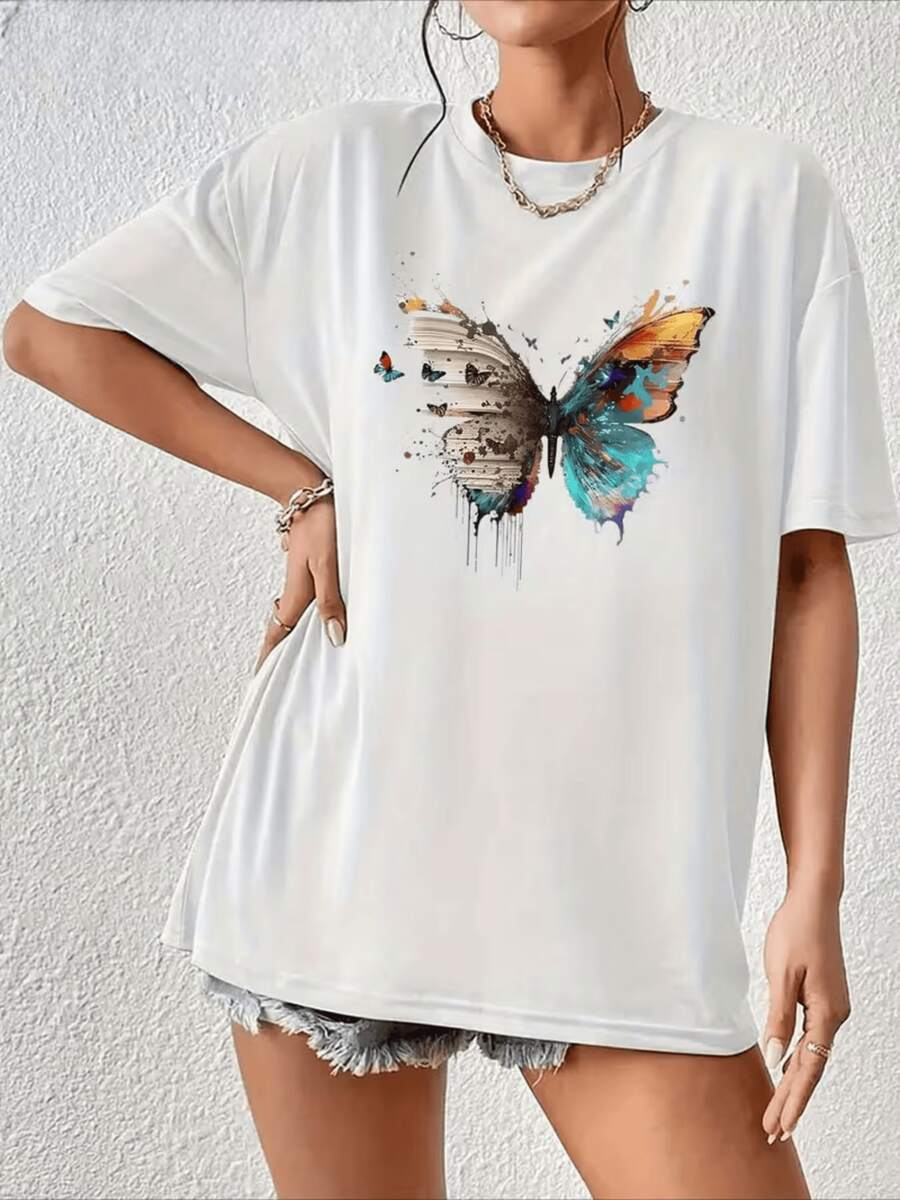 Mariposa con alas que se desvanecen en una explosión de colores simbolizando libertad y transformación camiseta de mujer blanca moderna casual cómoda para verano - Blanco - Ver 1