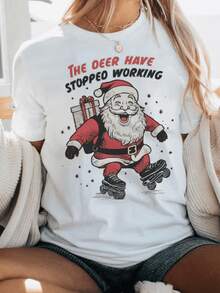 Santa patinando feliz con regalos simboliza alegría navideña y descanso después del trabajo transmitiendo humor festivo y espíritu positivo camiseta de mujer casual cómoda moderna - Blanco - Ver 8
