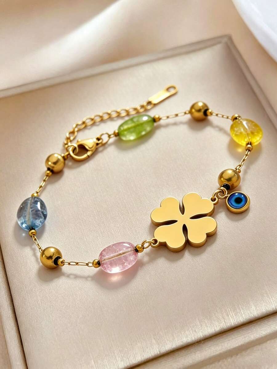 VceTd 这款简约不锈钢吊坠手链采用四叶花和不对称串珠设计,适合女性日常、旅行或度假佩戴,也是馈赠亲友的绝佳礼物。 - 金黃色 - 查看 1