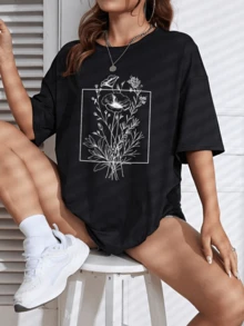 Delicate Wildflowers Representing Freedom And Harmony With Fine, Soft Lines Forming A Natural Garden Within An Elegant Frame. Women's T-Shirt With A Modern Artistic Print And Comfortable Fit - 黑色 - 查看 1