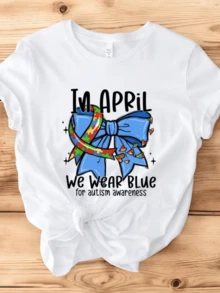 Blue Ribbon With Puzzle Pieces Symbolizing Autism Awareness In April, Conveying Support, Understanding, And Hope. Comfortable And Stylish Casual Women's T-Shirt - White - View 8
