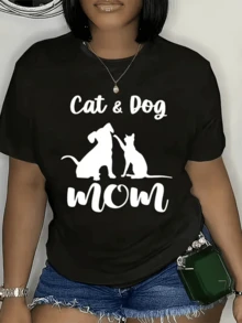 Two Silhouettes Symbolizing The Loving Connection Between An Animal-Loving Mother And Her Loyal Companions, Cat And Dog, Creating An Image Of Harmony And Tenderness. Comfortable Casual Women's T-Shirt For Everyday Wear. - 黑色 - 查看 8