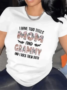 A Phrase Celebrating The Pride Of Being A Mother And Grandmother, With Lettering Decorated With Flowers And Leaves Symbolizing Love, Unity, And Strength. A Modern, Comfortable, Casual Women's T-Shirt For Everyday Wear. - 白色 - 查看 8