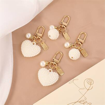 New Pearl Alloy Keychain Pendant, Creative Pearl Hollow Heart Accessory, Bluetooth Earphone Case Bag Charm