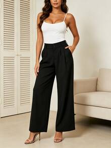 Wide-Leg, High-Waisted Trousers With A Pleated Design That Defines The Waist And Elongates The Figure. Made From A Soft, Flowing Fabric That Won't Wrinkle And Offers All-Day Comfort. Their Versatile Style Allows Them To Be Paired With Anything From Basic Tees To Elegant Blouses, Making Them Ideal For Work, Outings, Or Special Occasions. With Functional Details Like Pockets And An Elasticated Back, They Flatter All Body Types And Styles, Becoming A Wardrobe Essential. - 黑色 - 查看 4