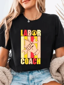 A Raised Fist Holding A Tool Symbolizes Strength, Unity, And Pride In Manual Labor. Against A Background Of Warm Tones, This Comfortable, Casual, Modern Women's T-Shirt Is A Stylish And Comfortable Design. - Black - View 8