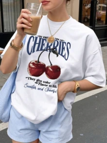 Two Bright Cherries Represent Friendship And Sweetness, Symbolizing Positive Energy And The Zest For Life With A Cheerful And Youthful Touch. This Casual White Women's T-Shirt With A Motivational Message Is Ideal For Summer. - 白色 - 查看 8