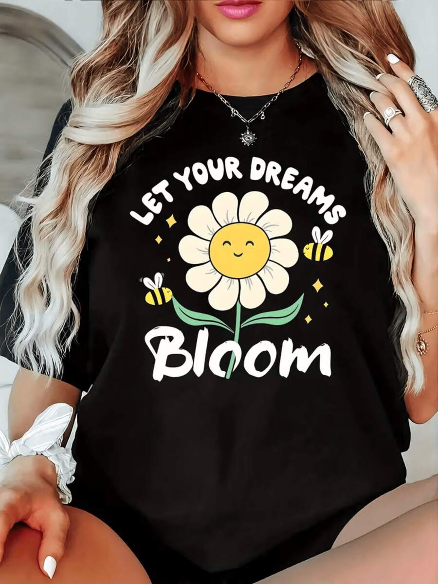 A Smiling Flower Surrounded By Bees Symbolizes Positive Energy And Inspiration For Your Dreams To Bloom With Joy And Hope. This Casual Women's T-Shirt With A Motivational Message And Cheerful Print Is Ideal For Everyday Wear. - 黑色 - 查看 1