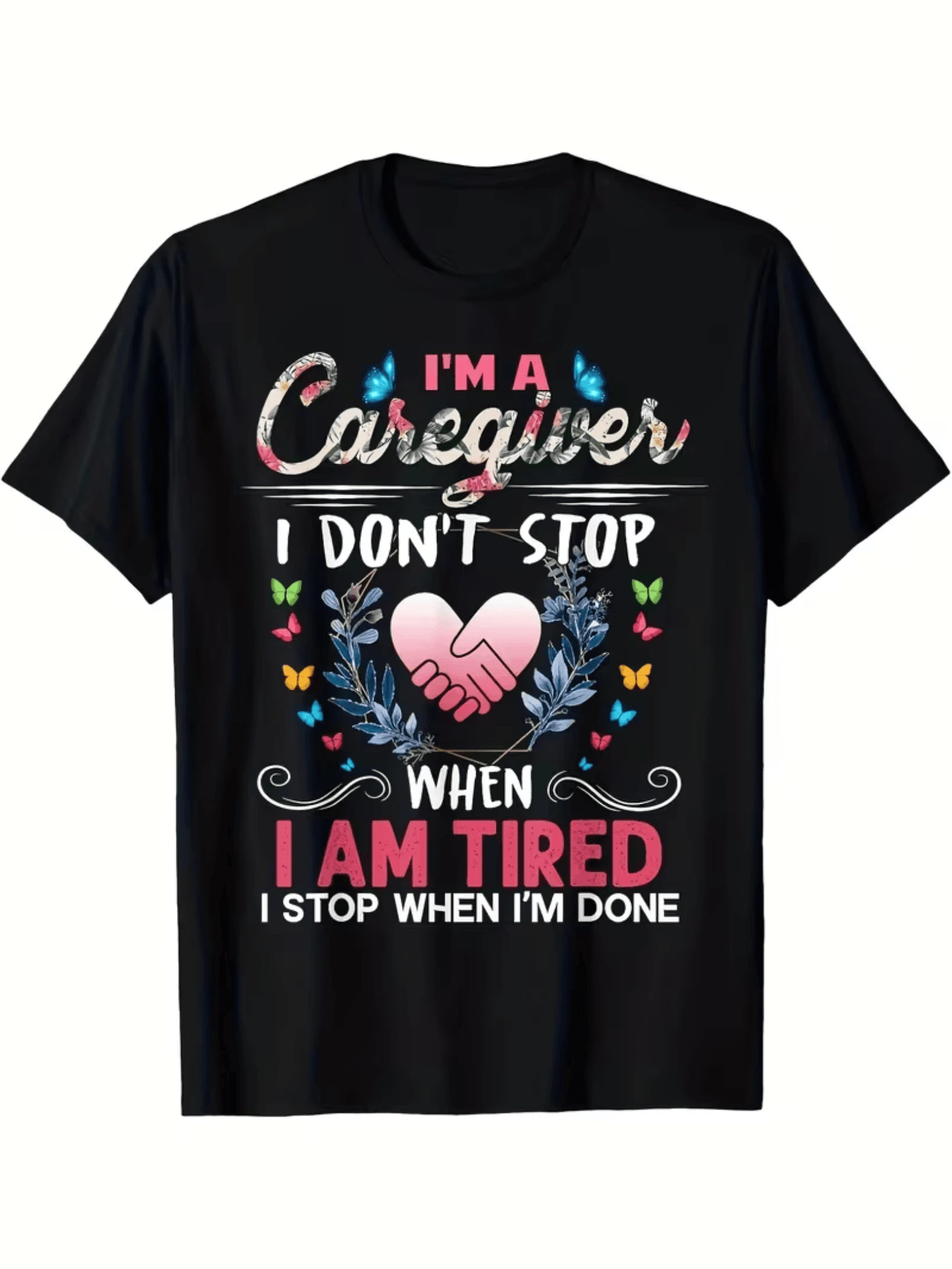 Corazón rosado con manos entrelazadas rodeadas de mariposas y hojas simbolizando empatía fortaleza y dedicación camiseta de mujer con mensaje inspirador para cuidadoras solidarias - Negro - Ver 1