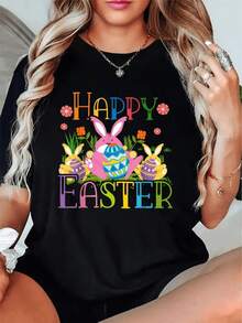 Coloridos conejos sosteniendo huevos decorados rodeados de flores simbolizan alegría y renovación celebrando Pascua camiseta de mujer casual cómoda para fiesta y uso diario - Negro - Ver 1