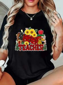 Sunflowers Alongside Books, Apples, And A Mug Celebrate The Teacher's Dedication With A Warm And Cheerful Touch That Inspires A Love Of Learning. A Comfortable And Modern Casual Women's T-Shirt For Everyday Wear. - 黑色 - 查看 8