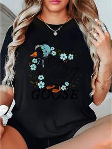 Goose With A Blue Hat Surrounded By Light Blue Flowers Symbolizing Tenderness And Tranquility, Conveying A Sense Of Calm And Joy. Comfortable And Modern Casual Women's T-Shirt For Everyday Wear. - 黑色 - 查看 1