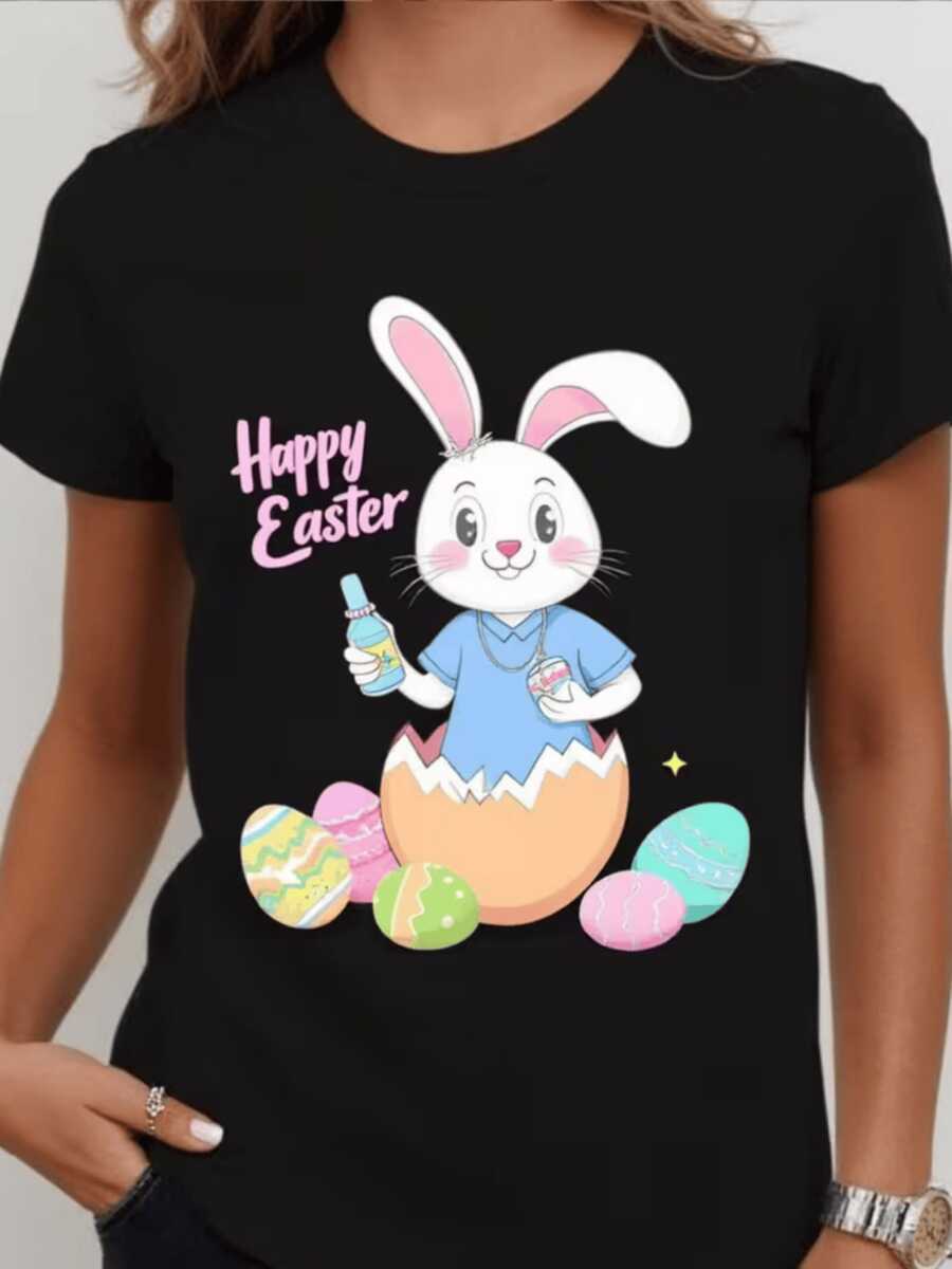 Cheerful Bunny Emerging From A Pastel-Decorated Egg Holding A Drink And Surrounded By Easter Eggs Symbolizing Happiness And Rebirth. Comfortable Casual Women's T-Shirt For Easter Celebration - 黑色 - 查看 1