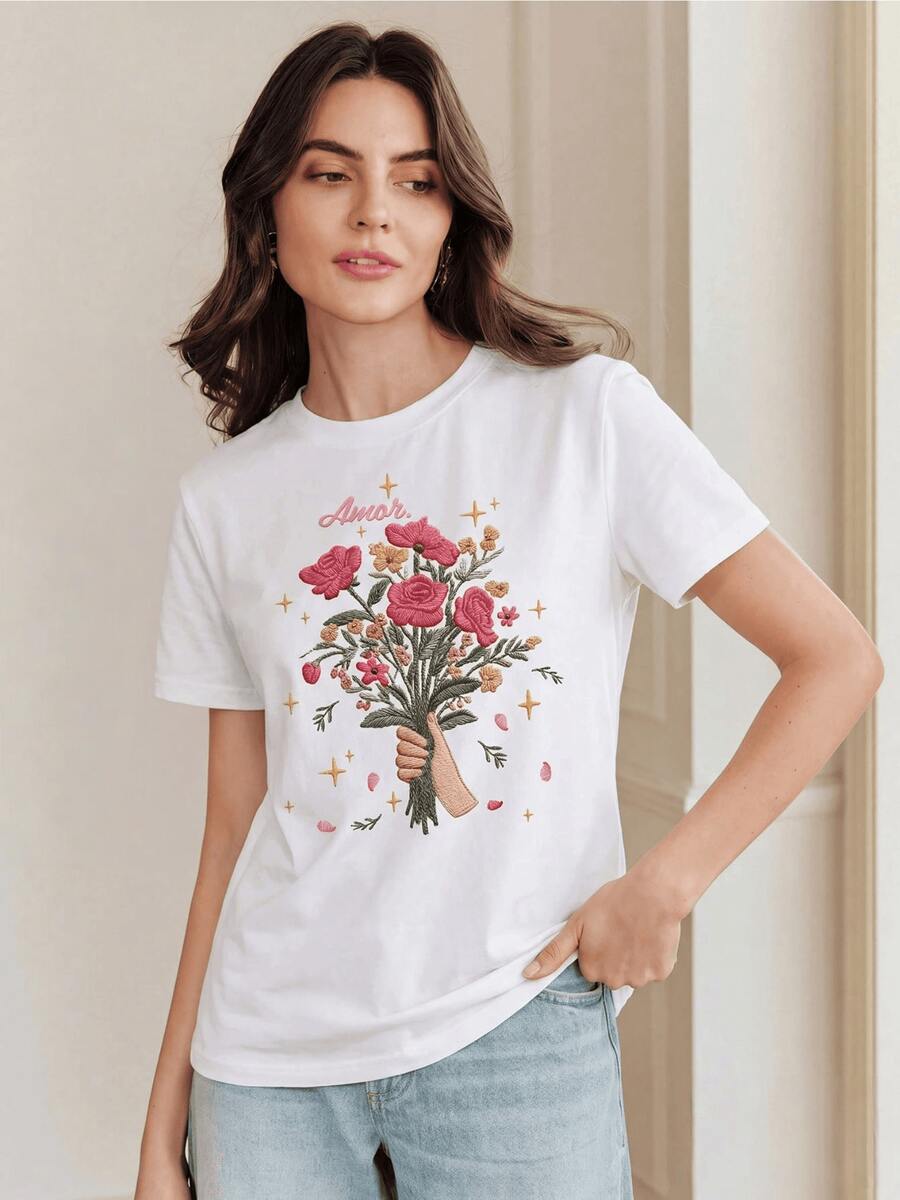 A Bouquet Of Flowers Held In One Hand Symbolizes The Strength Of True Love That Blossoms With Hope And Joy, Surrounded By Golden Sparkles And Petals That Represent Inner Beauty And Peace Of Mind. Casual T-Shirt, Comfortable, Lightweight, And Modern, Perfect For Everyday Wear. - 白色 - 查看 1