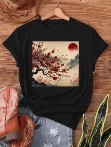 Oriental Landscape With Rising Sun Over Mountains And Cherry Blossom Branches Symbolizing Renewal And Serenity, Perfect For Conveying Calm And Beauty. Women's Casual Modern T-Shirt, Comfortable For Everyday Wear. - 黑色 - 查看 1