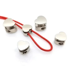 Khóa dây rút hình trái tim đa chức năng, khóa điều chỉnh lò xo, nút chặn dây rút áo nỉ và ba lô, phụ kiện quần áo, phụ tùng thủ công, bền và thiết thực, đồ dùng tự làm mũ và may vá. - Nhiều màu - Xem 10