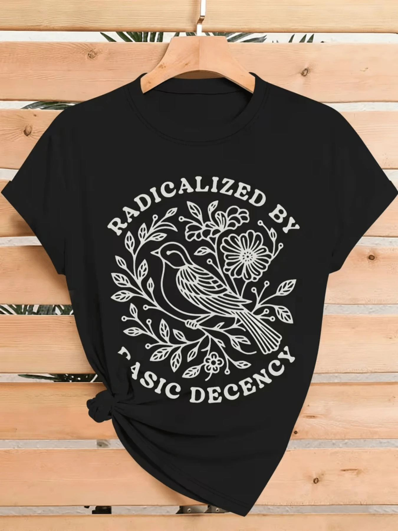 Bird Surrounded By Branches And Flowers Symbolizing The Harmony Between Nature And Inner Purity With A Powerful Message Of Respect And Social Awareness. Comfortable, Casual, Modern Women's T-Shirt For Everyday Wear. - Black - View 1