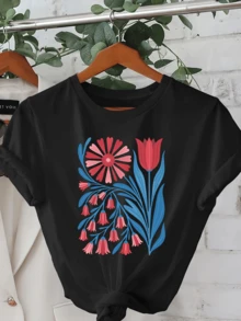 Flores rojas y azules que simbolizan energía vital y equilibrio natural formando un conjunto armónico que inspira serenidad y alegría camiseta de mujer moderna casual cómoda para uso diario - Negro - Ver 6