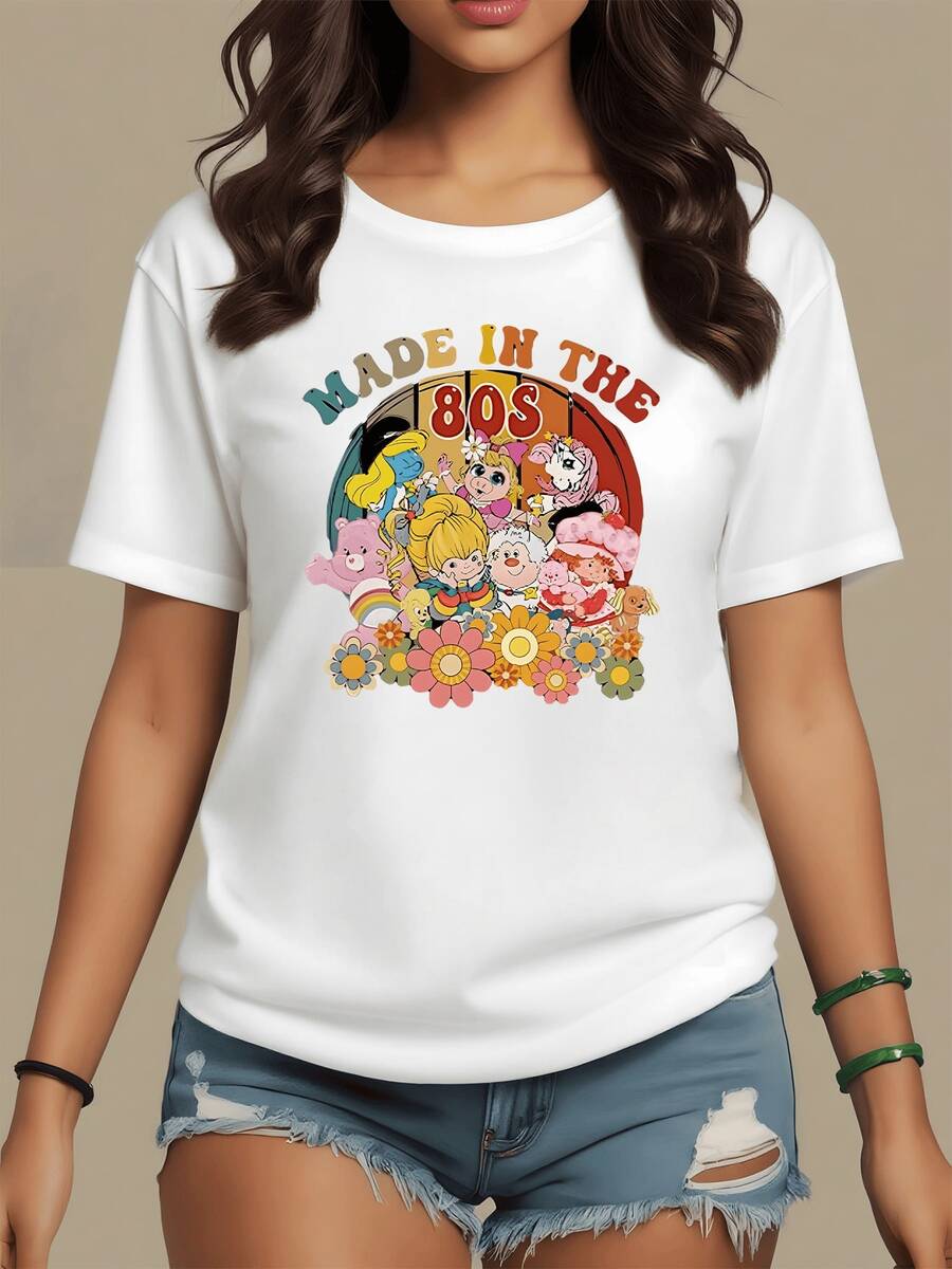 Colorful Design With Classic Characters And Cheerful Flowers That Evoke The Nostalgia And Fun Of The 80s, Perfect For Expressing A Youthful And Positive Spirit. Comfortable Casual Women's T-Shirt Ideal For Everyday Wear. - 白色 - 查看 1