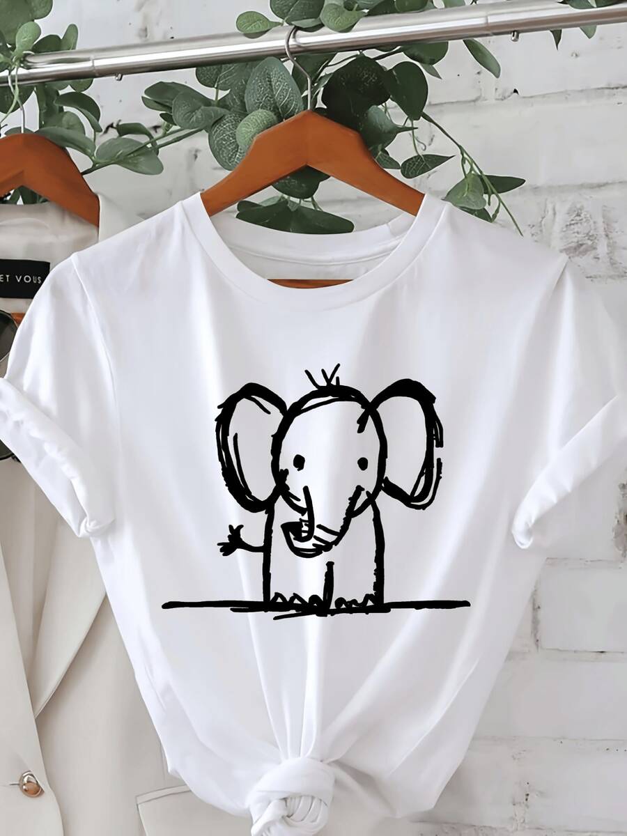 Un pequeño elefante sonriente con brazos abiertos representa ternura inocencia y buena suerte transmitiendo alegría y serenidad camiseta de mujer casual cómoda y moderna ideal para uso diario - Blanco - Ver 1