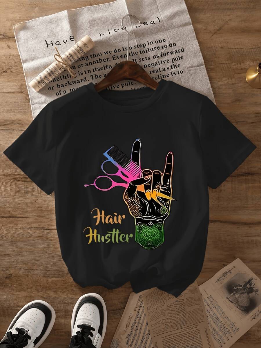 Raised Hand With Comb, Scissors, And Vibrant Colors Symbolizing Creativity, Energy, And Pride In The Art Of Hairstyling; Modern, Comfortable, Casual Women's T-Shirt For Stylists - Black - View 1