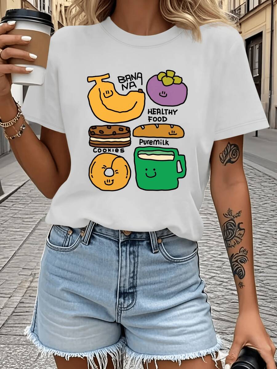 Frutas sonrientes que representan la alegría de un desayuno saludable con banana pan galletas leche y coloridos personajes divertidos que inspiran energía positiva camiseta de mujer casual moderna cómoda para uso diario - Blanco - Ver 1