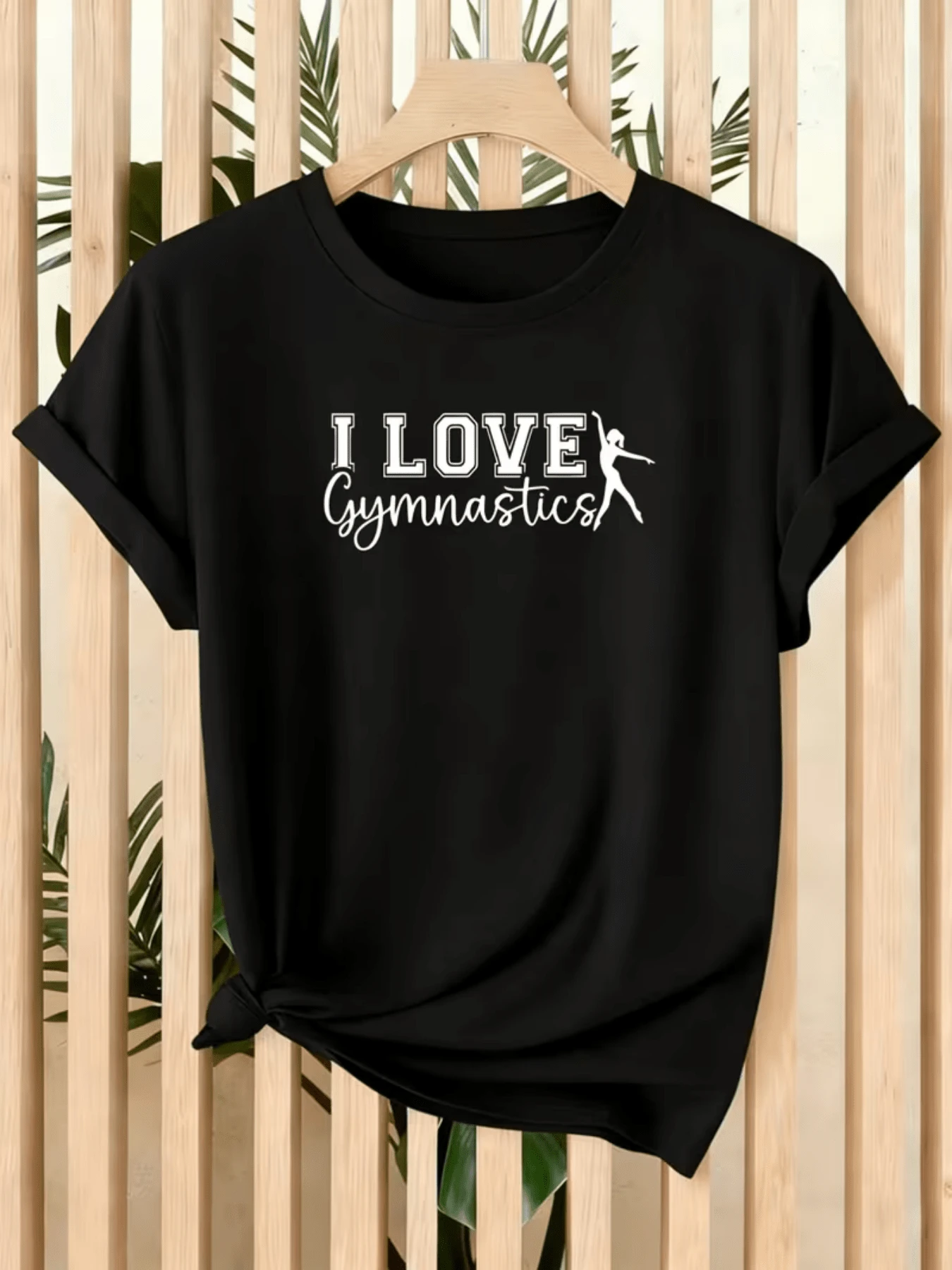 Motivational Phrase Expressing Passion For Gymnastics, Showing An Elegant, Moving Female Silhouette Symbolizing Strength, Balance, And Love For The Sport. Casual, Comfortable, And Modern Women's T-Shirt - 黑色 - 查看 1