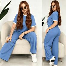 Comfort And Style In One Outfit! Upgrade Your Look With Our 2-Piece Set: A Ribbed Top And Super Comfortable Pants. Available In Various Colors. Women's 2-Piece Casual Set: Short-Sleeve Crew Neck Top And High-Waisted Loose Wide-Leg Pants - Ribbed Textured Loungewear Set For Summer And Yoga - 藍色 - 查看 2