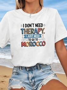 Motivational Phrase About Traveling And Finding Personal Well-Being In Morocco With Colorful Lettering Inspired By The Joy Of Travel And Freedom. Casual Women's T-Shirt For Beach Vacations And Relaxed Moments. - 白色 - 查看 1