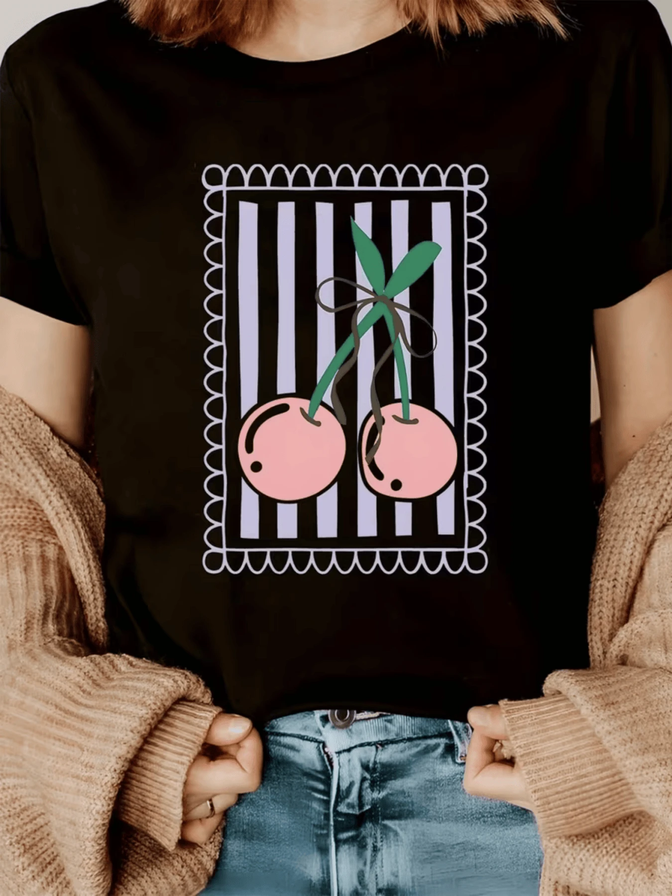 Two Pink Cherries Intertwined With Green Leaves On A Background Of Vertical Stripes Reflect Sweetness, Vitality, And Modern Feminine Energy. A Comfortable, Flattering, Casual Women's T-Shirt For Everyday Wear. - 黑色 - 查看 1