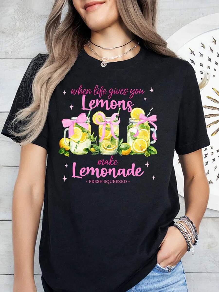 Playera Oversize con Diseño de Limonada y Moños Rosas - Suave y Fresca, para Playa, Vacaciones y Uso Diario - Negro - Ver 1