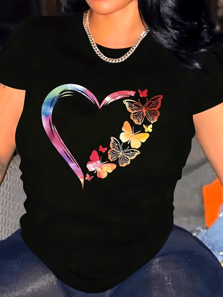 Camiseta elegante para mujer con estampado de corazón y mariposa en colores vibrantes, blusas,lavable a máquina. Prenda casual versátil para primavera, verano y otoño, tela opaca que disimula la figura y favorece la silueta. Disponible en múltiples tallas