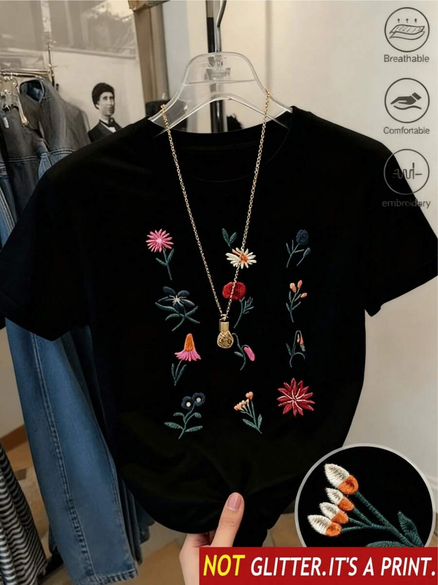 Flores bordadas representan la alegría de la naturaleza y la renovación del alma con tonos vibrantes que evocan armonía y libertad camiseta de mujer casual transpirable cómoda perfecta para uso diario - Negro - Ver 1