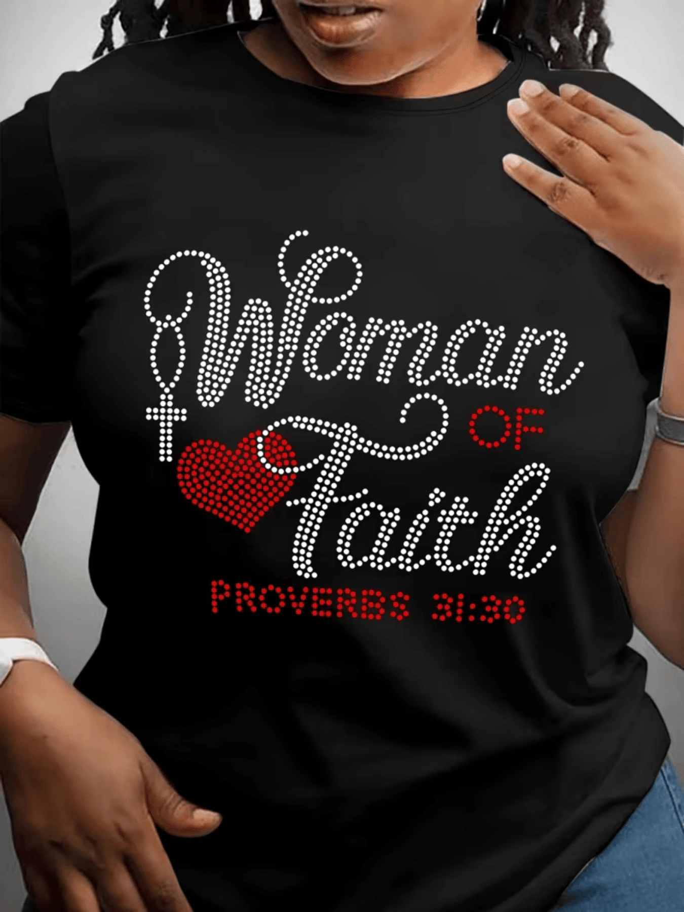 A Phrase Celebrating Inner Feminine Strength, Accompanied By A Heart And A Cross Symbolizing Hope And Deep Devotion. Women's T-Shirt With An Inspirational Message And A Modern Touch For Everyday Wear. - Black - View 1
