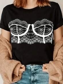 Patrón de trazos blancos formando un conjunto de encaje estilizado que simboliza elegancia y feminidad con motivos de delicadeza y confianza camiseta de mujer moderna casual para uso diario - Negro - Ver 1