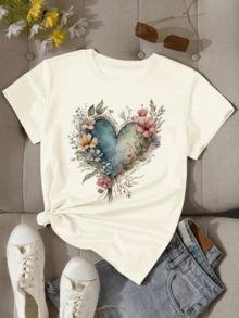 Blue Heart Surrounded By Wildflowers Symbolizing Serenity, Natural Love And Hope With Soft Tones That Evoke Harmony And Connection With Nature. Casual, Comfortable And Modern Women's T-Shirt - 白色 - 查看 1