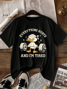 Duck With A Funny Expression Lifting Weights, Symbolizing Daily Effort And The Tiredness Of Moving Forward With Good Humor And Energy. Comfortable Casual Women's T-Shirt For Everyday Wear. - 黑色 - 查看 8