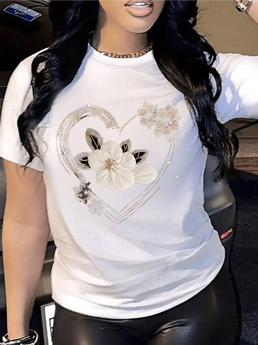 Corazón brillante formado por líneas doradas que rodean flores blancas con pétalos suaves y detalles luminosos simbolizando amor pureza y energía femenina camiseta de mujer casual elegante moderna - Blanco - Ver 1