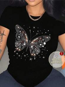 A Butterfly Formed By Bright Sparkles Symbolizing Freedom, Hope, And Inner Beauty, Surrounded By Stars That Evoke Dreams And New Energy. Women's T-Shirt With An Elegant And Modern Print - 黑色 - 查看 1