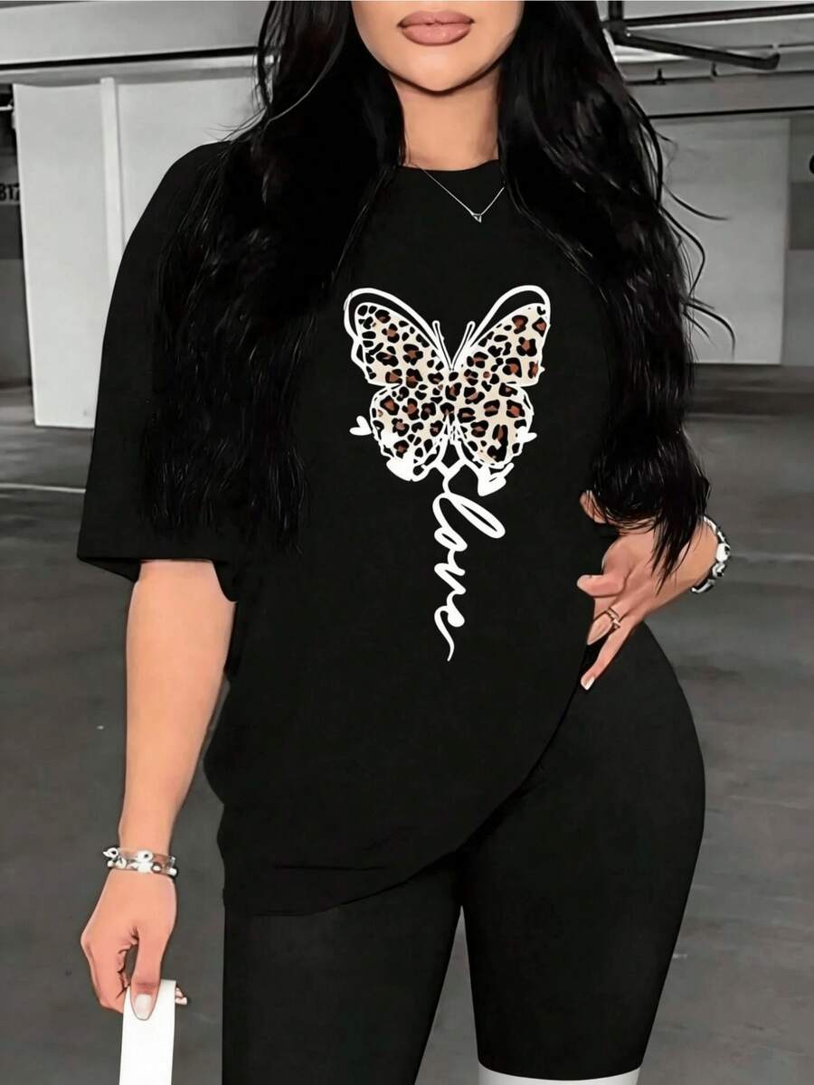 Mariposa con patrón de leopardo que simboliza la libertad la fuerza interior y la transformación personal con palabra amor aportando un mensaje positivo camiseta de mujer cómoda moderna y atractiva - Negro - Ver 1