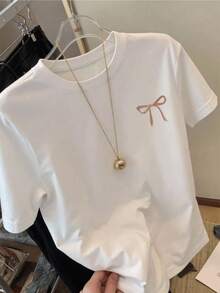 Un lazo delicado representa la elegancia sencilla y la belleza interior que resalta la feminidad con un toque de suavidad y armonía perfecta camiseta de mujer casual cómoda y moderna para uso diario - Blanco - Ver 8