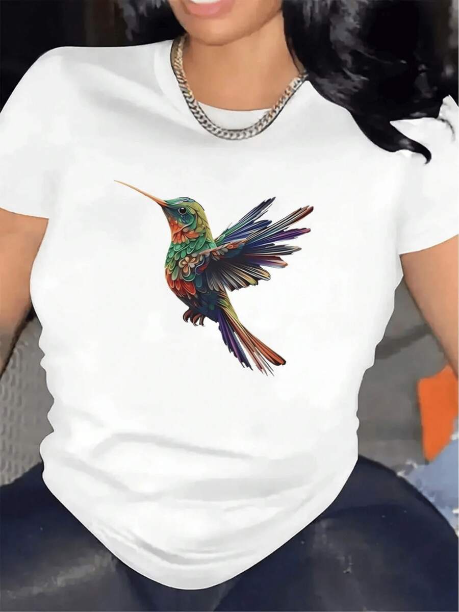Colibrí multicolor que simboliza libertad belleza y energía vital con alas extendidas mostrando un espíritu alegre y positivo camiseta de mujer casual moderna y cómoda para diario - Blanco - Ver 1